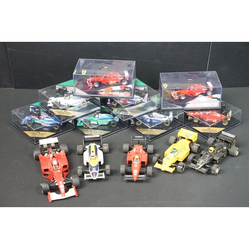 187 - Eight boxed / cased diecast models to include 6 x Heritage Formula One models including 210 Williams... 