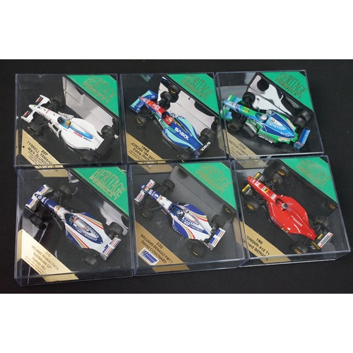 187 - Eight boxed / cased diecast models to include 6 x Heritage Formula One models including 210 Williams... 