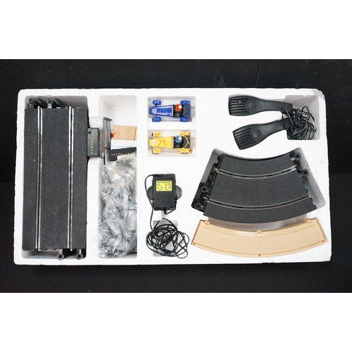 212 - Two boxed Scalextric sets including Monaco GP and Caterham Cup, boxed Subbuteo 60260 UEFA Euro 96 se... 