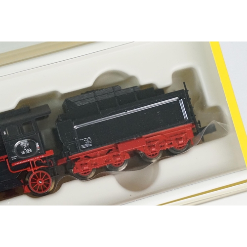 51 - Three cased Trix Minitrix N gauge locomotives to include 12456 Dampflock BR 18.5 EP III, 12269 Diese... 