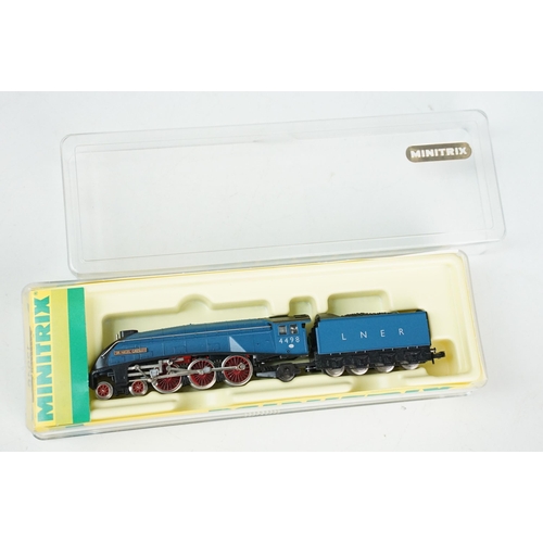 51 - Three cased Trix Minitrix N gauge locomotives to include 12456 Dampflock BR 18.5 EP III, 12269 Diese... 