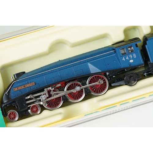 51 - Three cased Trix Minitrix N gauge locomotives to include 12456 Dampflock BR 18.5 EP III, 12269 Diese... 