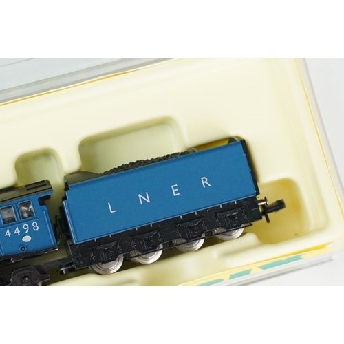 51 - Three cased Trix Minitrix N gauge locomotives to include 12456 Dampflock BR 18.5 EP III, 12269 Diese... 