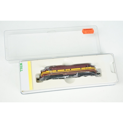 51 - Three cased Trix Minitrix N gauge locomotives to include 12456 Dampflock BR 18.5 EP III, 12269 Diese... 