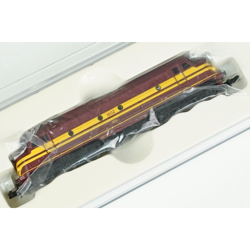 51 - Three cased Trix Minitrix N gauge locomotives to include 12456 Dampflock BR 18.5 EP III, 12269 Diese... 