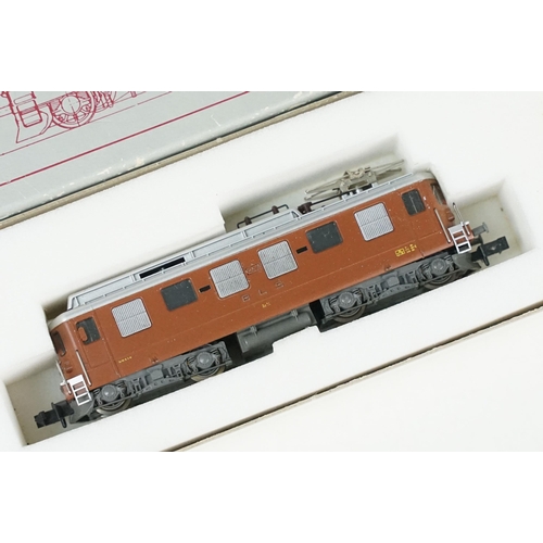 52 - Four cased / boxed N gauge locomotives to include 2 x Kato (K11604 SBB CFF Re 4/4 I & KAC-13709-11 S... 