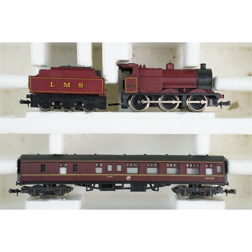 66 - Boxed Lima N gauge train set with varying contents to include Lima 0-6-0 LMS locomotive in maroon, 2... 