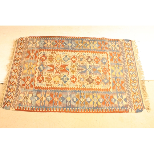 618 - 20th Century kilim rug woven with geometric design with cream ground panel to centre. Measures 97 x ... 