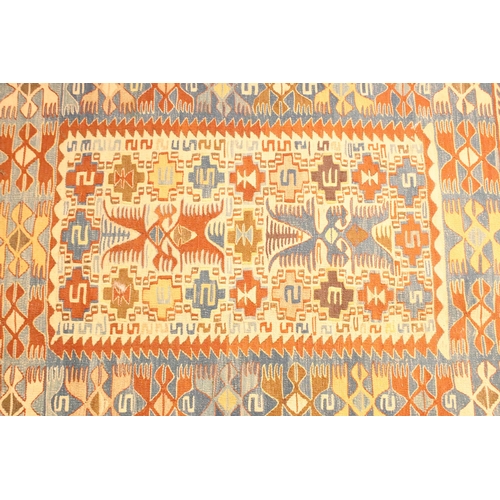 618 - 20th Century kilim rug woven with geometric design with cream ground panel to centre. Measures 97 x ... 