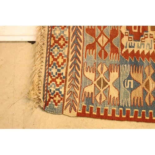 618 - 20th Century kilim rug woven with geometric design with cream ground panel to centre. Measures 97 x ... 