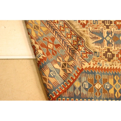 618 - 20th Century kilim rug woven with geometric design with cream ground panel to centre. Measures 97 x ... 