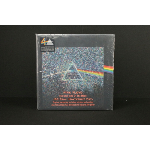 197 - Vinyl / CD's - 3 Pink Floyd Anniversary issues of Dark Side Of The Moon LP albums and one CD box set... 