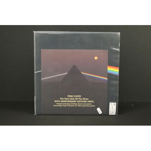 197 - Vinyl / CD's - 3 Pink Floyd Anniversary issues of Dark Side Of The Moon LP albums and one CD box set... 