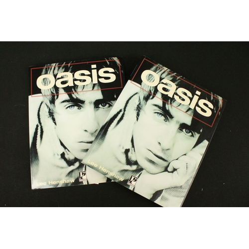 702 - Memorabilia - 3 Oasis books, a Be Here Now 1997 tour programme, and a 1998 official calendar