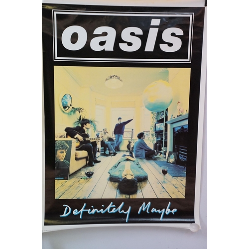 738 - Memorabilia - 2 Oasis posters to include Definitely Maybe and band shot. Both measure approx 90.5H x... 