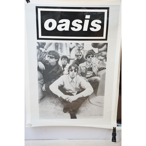 738 - Memorabilia - 2 Oasis posters to include Definitely Maybe and band shot. Both measure approx 90.5H x... 