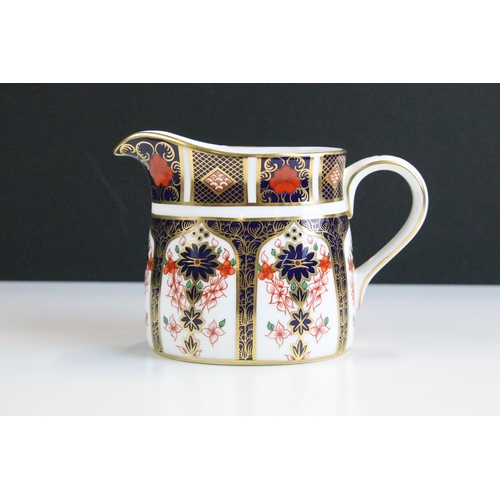 15 - Royal Crown Derby 'Old Imari' 1128 pattern part tea set to include six cups and saucers and milk jug