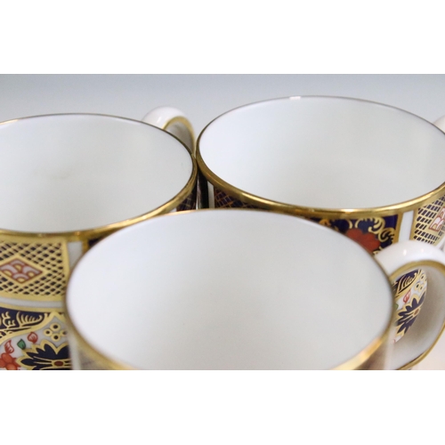 15 - Royal Crown Derby 'Old Imari' 1128 pattern part tea set to include six cups and saucers and milk jug