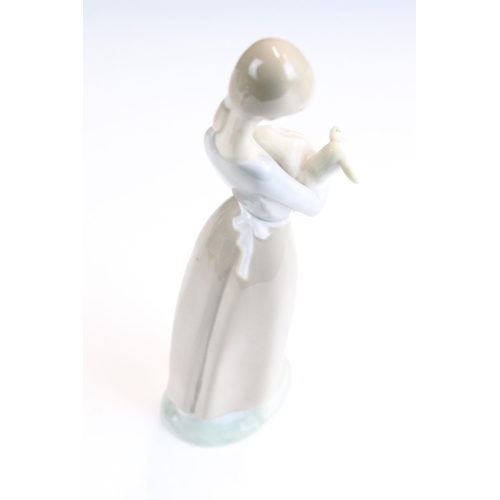 16 - Selection of Lladro figurines to include girl with lamb, girl with duck and bucket, boy in night gow... 