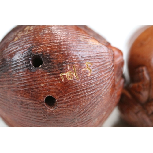 Two signed carved wooden netsuke figures to include Turtles on pot and ...