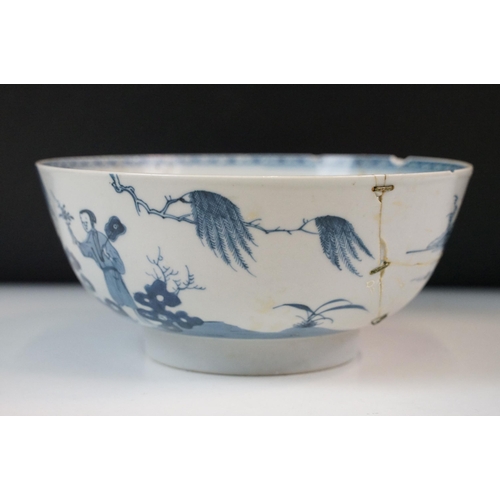 19 - Two Chinese Qing dynasty bowls to include a blue and white painted bowl depicting figures in a garde... 