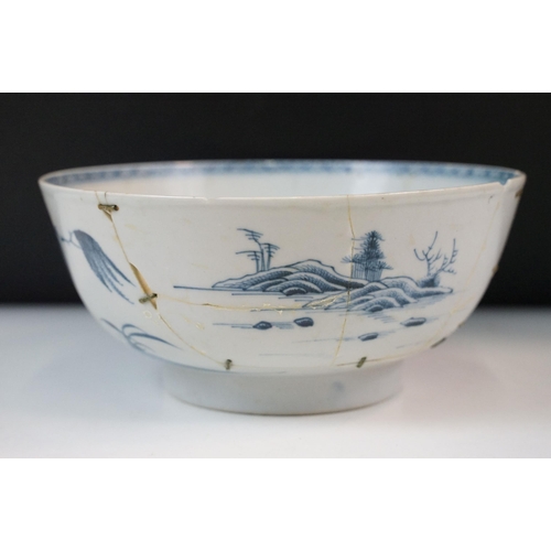 19 - Two Chinese Qing dynasty bowls to include a blue and white painted bowl depicting figures in a garde... 