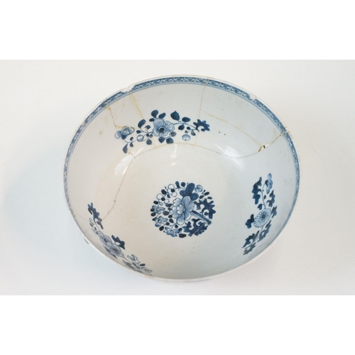 19 - Two Chinese Qing dynasty bowls to include a blue and white painted bowl depicting figures in a garde... 