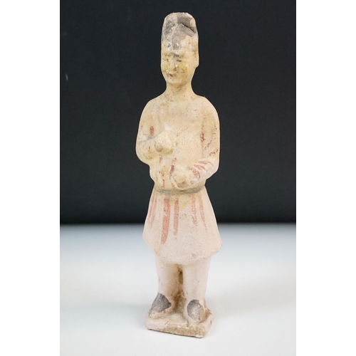 25 - Tang Dynasty painted figure H 23cm together with a pottery patterned pitcher jug H 24cm