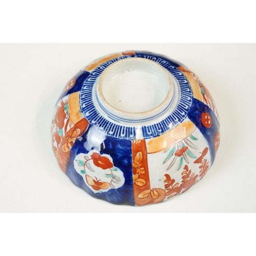 26 - Group of Japanese blue and red Imari five bowls and plate, smallest 13cm diameter, plate 21.5cm diam... 