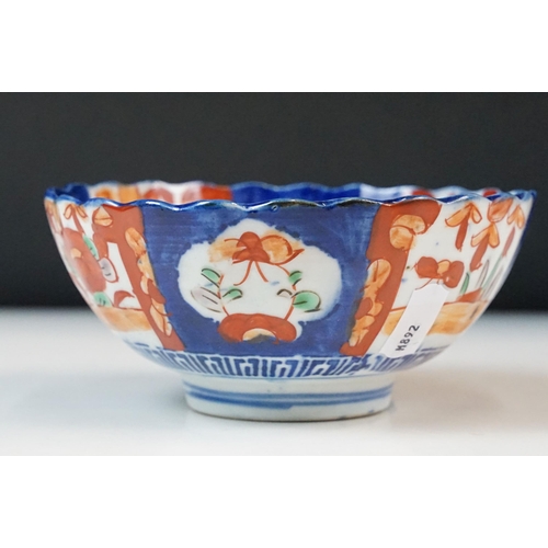 26 - Group of Japanese blue and red Imari five bowls and plate, smallest 13cm diameter, plate 21.5cm diam... 