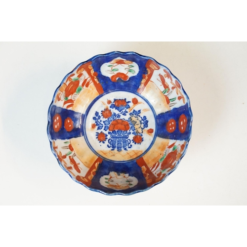 26 - Group of Japanese blue and red Imari five bowls and plate, smallest 13cm diameter, plate 21.5cm diam... 