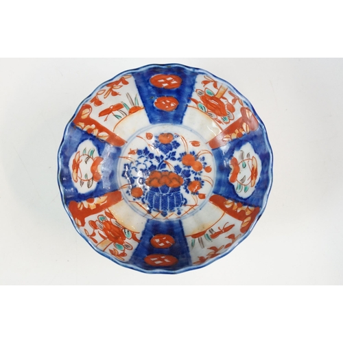 26 - Group of Japanese blue and red Imari five bowls and plate, smallest 13cm diameter, plate 21.5cm diam... 