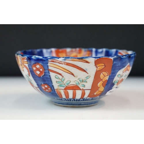 26 - Group of Japanese blue and red Imari five bowls and plate, smallest 13cm diameter, plate 21.5cm diam... 