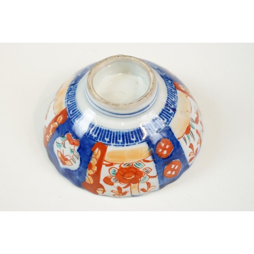 26 - Group of Japanese blue and red Imari five bowls and plate, smallest 13cm diameter, plate 21.5cm diam... 