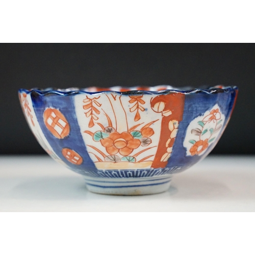 26 - Group of Japanese blue and red Imari five bowls and plate, smallest 13cm diameter, plate 21.5cm diam... 