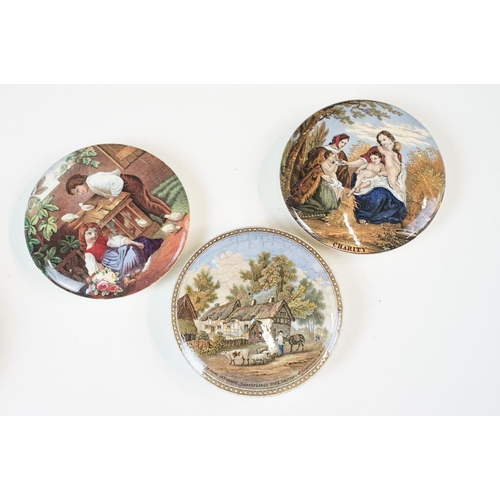 27 - Group of Pratt Ware pot lids and bases to include Persuasion, Stratford Upon Avon, The wolf and the ... 