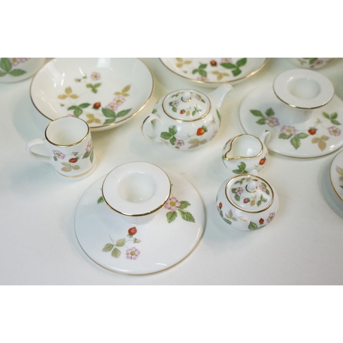 38 - Wedgwood 'Wild Strawberry' Bone China mixed items to include trinket box, bulb vases, cup, vase, can... 