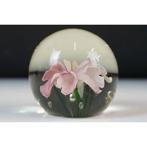 40 - Mixed shape coloured glass paperweights to include floral and millefiori examples, 8 total