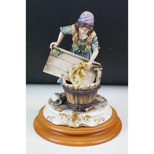 41 - Mixed collection of ceramics to include Capodimonte washer woman, Gramophone with flowers, a boy wit... 