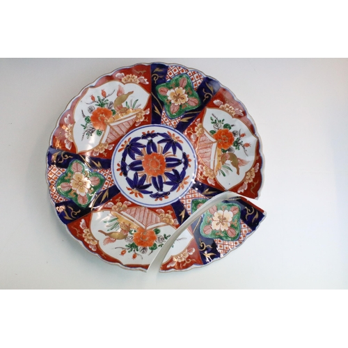 52 - Large Japanese Imari pattern scalloped plates, hand painted with gilt detail, 30cm diameter (one dam... 