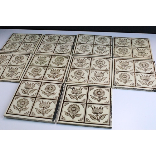 55 - Set of ten 20th century Art Nouveau brown and cream floral pattern tiles, 6 x 6 inch