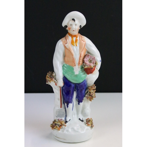 58 - Group of six 19th century Staffordshire figurines to include flower seller, man with mandolin, man w... 