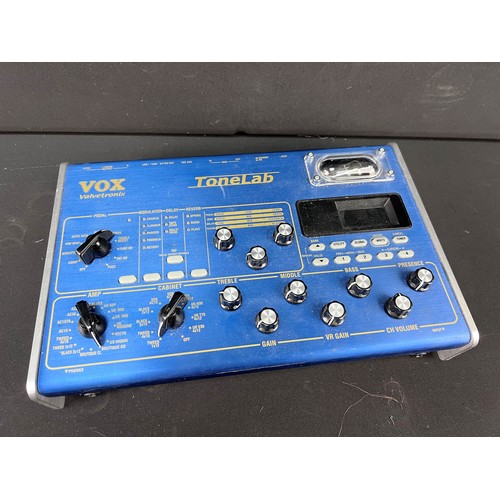 765 - Guitar - Line 6 POD XT Live multi effects pedal, along with a Vox Valvetronix ToneLab