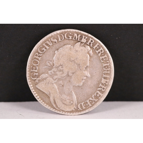 129 - A United Kingdom King George I 1724 silver shilling coin.