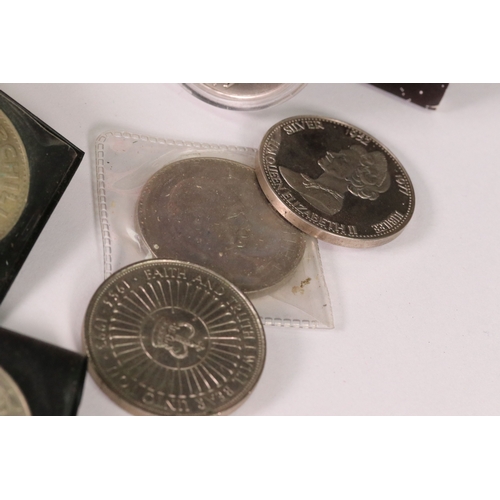 154 - A small collection of commemorative crown and £5 coins together with two medallions and a coin brace... 