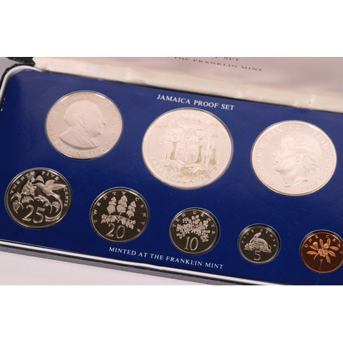 163 - A Franklin Mint 1974 Jamaica 8 coin proof set, all mounted within fitted display case and complete w... 