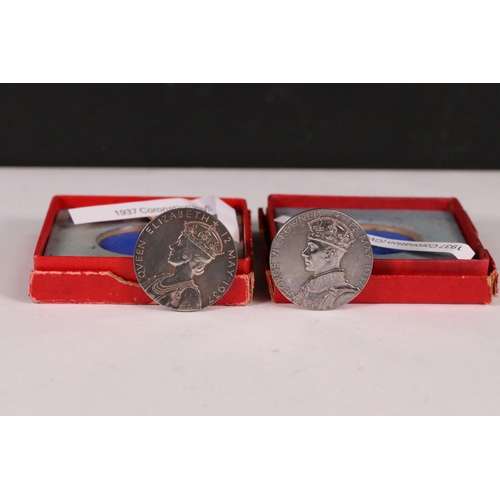 106 - Two British 1937 King George VI coronation 32mm silver medallions within original issue boxes.