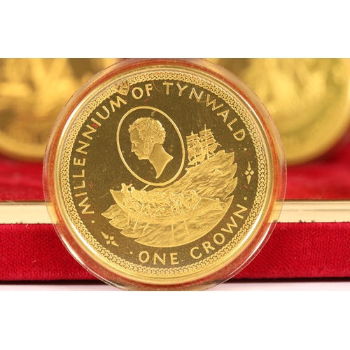 112 - A Pobjoy Mint Millennium of Tynwald silver one crown coin five coin set, coins encapsulated within f... 