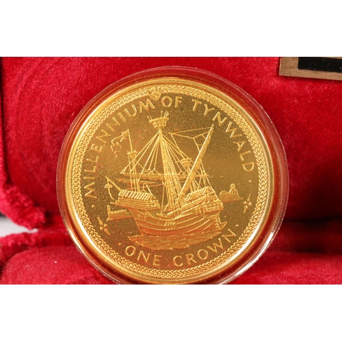 112 - A Pobjoy Mint Millennium of Tynwald silver one crown coin five coin set, coins encapsulated within f... 