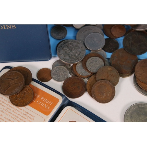 115 - A small collection of mainly British pre decimal coins to include silver and commemorative examples ... 